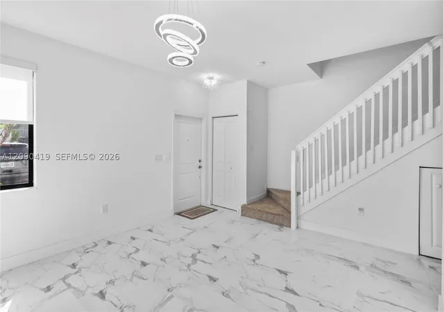 Photo 3 of Townhouse for sale at 957 NE 211th Street, Miami, FL 33179 | MLS# A12090419 | Listing updated on 2026-09-22
