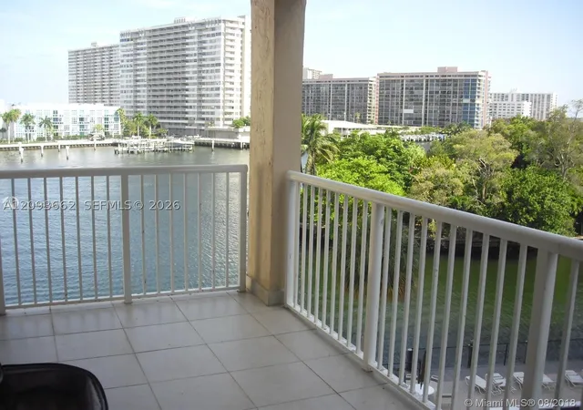 Photo 1 of Condo for sale at 121 Golden Isles Dr #407, Hallandale Beach, FL 33009 | MLS# A12093662 | Listing updated on 2026-09-23