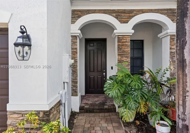 Photo 2 of Townhouse for sale at 11249 Nw 88th Terrace, Doral, FL 33178 | MLS# A12088313 | Listing updated on 2026-09-23