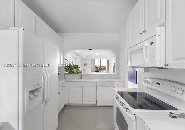 Photo 3 of Condo for sale at 10770 Nw 66th Street #404, Doral, FL 33178 | MLS# A12093475 | Listing updated on 2026-09-23