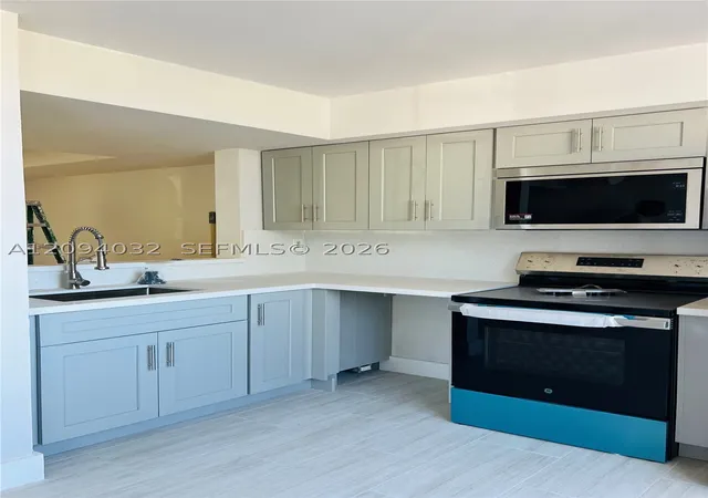 Photo 3 of Condo for sale at 380 Nw 85th Place #1406, Miami, FL 33126 | MLS# A12094032 | Listing updated on 2026-09-23