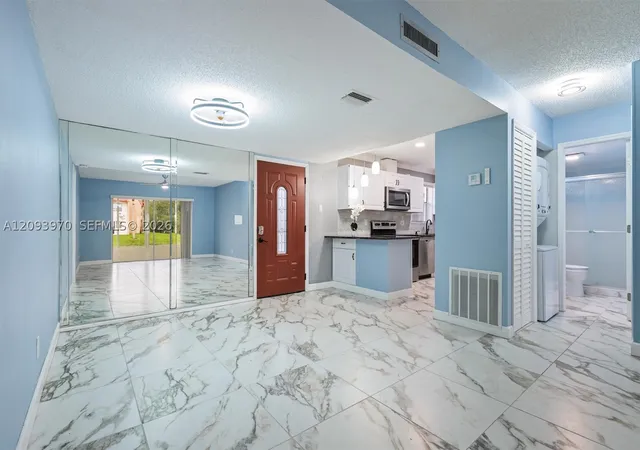 Photo 4 of Condo for sale at 236 Lake Dora Dr #236, West Palm Beach, FL 33411 | MLS# A12093970 | Listing updated on 2026-09-23