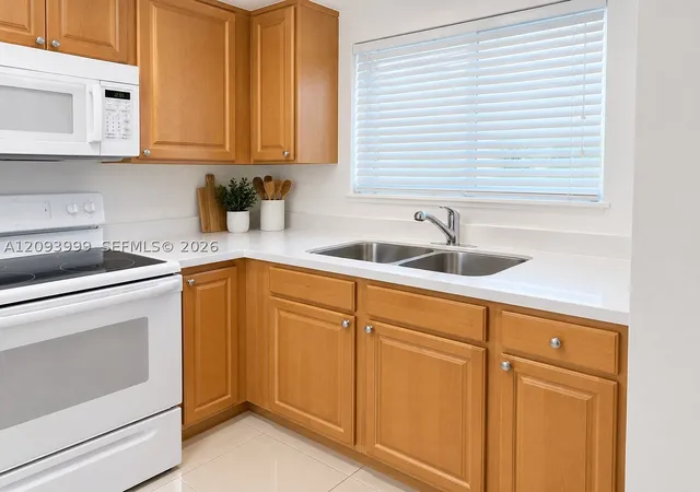 Photo 1 of Condo for sale at 770 Ne 128th Street #102, North Miami, FL 33161 | MLS# A12093999 | Listing updated on 2026-09-23