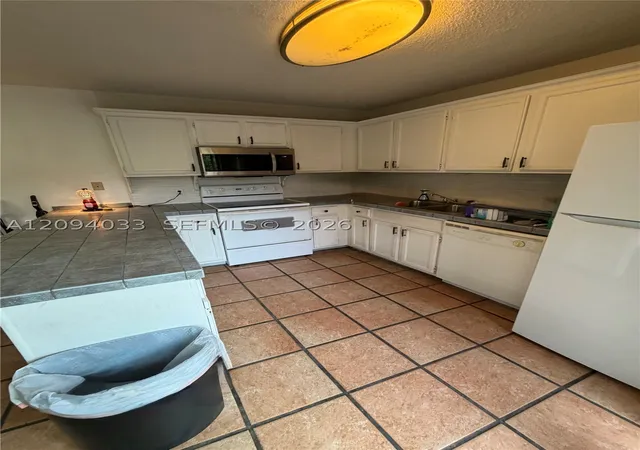 Photo 1 of Townhouse for sale at 2564 Lakeview Ct, Cooper City, FL 33026 | MLS# A12094033 | Listing updated on 2026-09-23