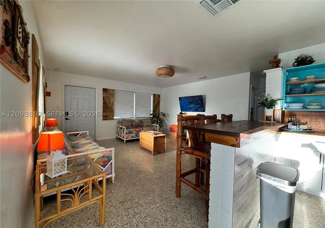 Photo 4 of Single family home for sale at 1684 NE Hilltop St, Jensen Beach, FL 34957 | MLS# A12093882 | Listing updated on 2026-09-23