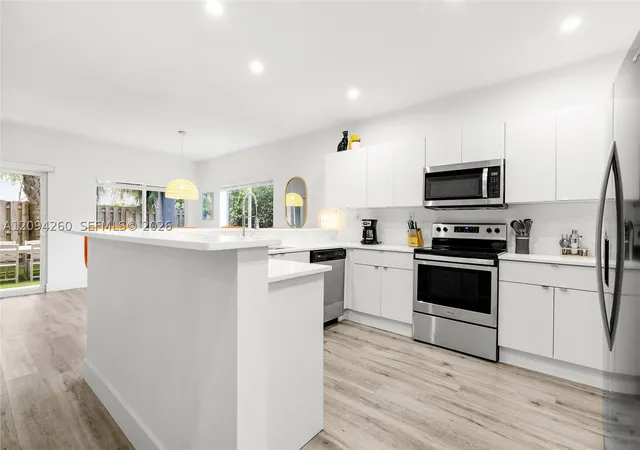 Photo 4 of Townhouse for sale at 1123 NE 23rd Terrace, Pompano Beach, FL 33062 | MLS# A12094260 | Listing updated on 2026-09-23