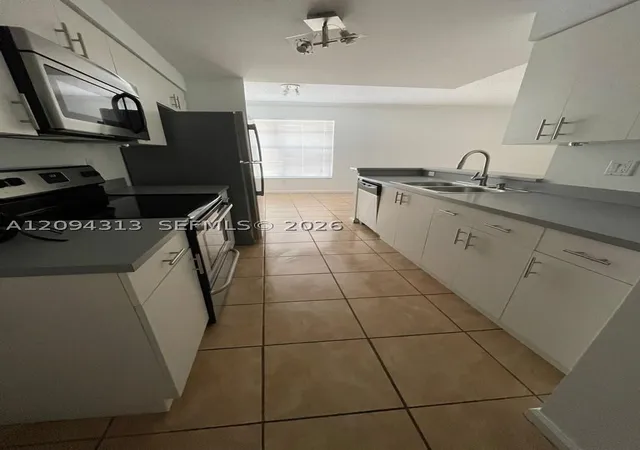 Condo for sale at 5840 W Sample Rd #105, Coral Springs, FL 33067 | MLS# A12094313