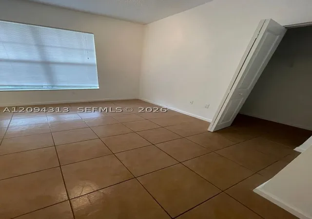 Photo 1 of Condo for sale at 5840 W Sample Rd #105, Coral Springs, FL 33067 | MLS# A12094313 | Listing updated on 2026-09-23