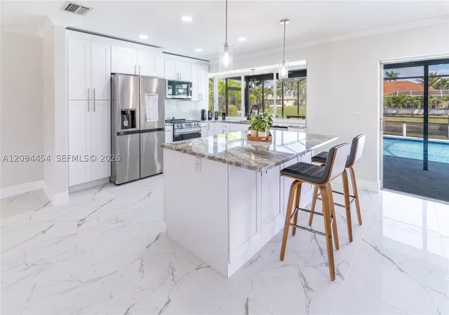 Photo 4 of Single family home for sale at 3405 Southeast 16, Cape Coral, FL 33904 | MLS# A12094454 | Listing updated on 2026-09-24