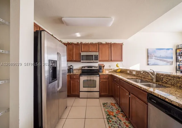 Listing Photo 5 - Condo for sale in building located at 11603 Nw 89Th St, Doral, FL 33178 - Unit #213