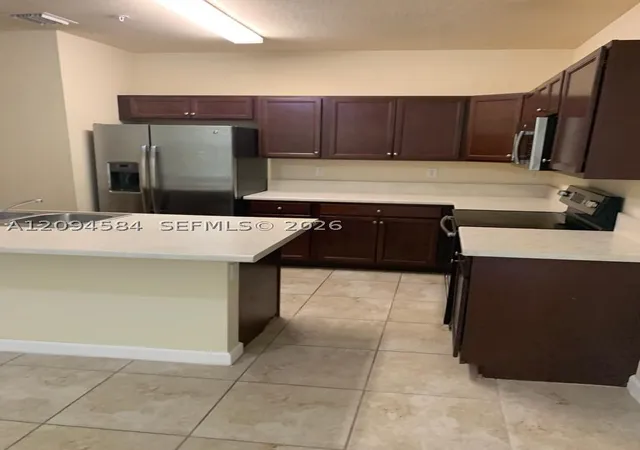 Photo 1 of Condo for sale at 142 SE 28th Terrace #10, Homestead, FL 33033 | MLS# A12094584 | Listing updated on 2026-09-24