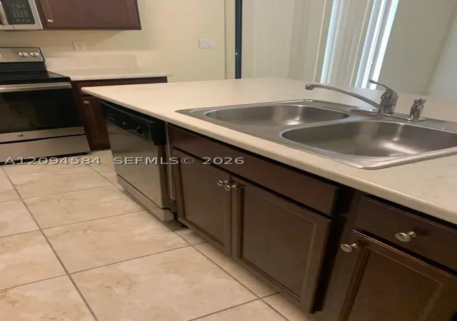 Photo 2 of Condo for sale at 142 SE 28th Terrace #10, Homestead, FL 33033 | MLS# A12094584 | Listing updated on 2026-09-24