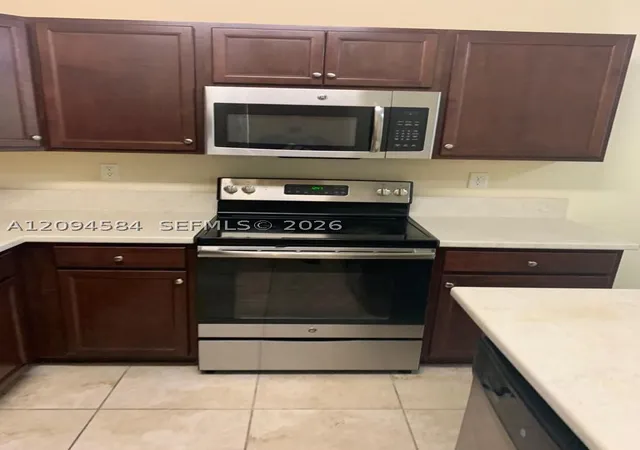 Photo 3 of Condo for sale at 142 SE 28th Terrace #10, Homestead, FL 33033 | MLS# A12094584 | Listing updated on 2026-09-24