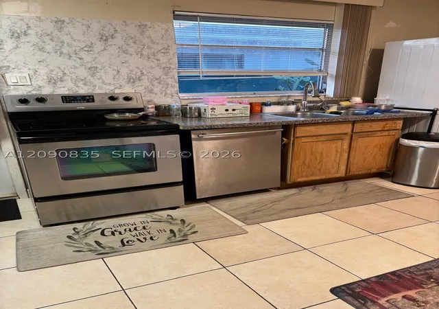 Photo 3 of Single family home for sale at 4610 SW 43rd Terrace, Dania Beach, FL 33314 | MLS# A12090835 | Listing updated on 2026-09-23