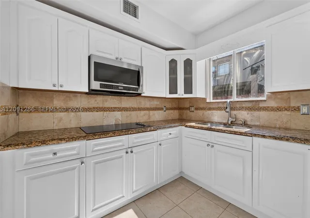 Photo 2 of Condo for sale at 7221 Nw 174th Terrace #102, Hialeah, FL 33015 | MLS# A12091286 | Listing updated on 2026-09-24