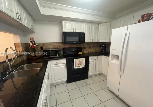 Photo 3 of Townhouse for sale at 961 W 37th Terrace #30, Hialeah, FL 33012 | MLS# A12094689 | Listing updated on 2026-09-29