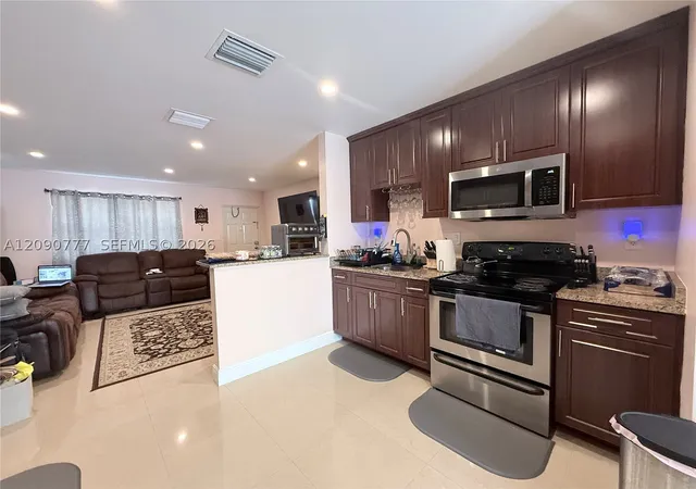 Photo 1 of Single family home for sale at 1878 Nw 45th Court, Tamarac, FL 33309 | MLS# A12090777 | Listing updated on 2026-09-24