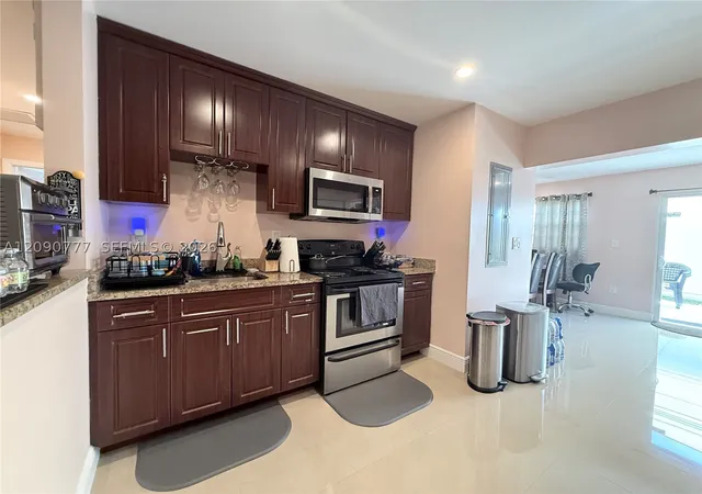 Photo 2 of Single family home for sale at 1878 Nw 45th Court, Tamarac, FL 33309 | MLS# A12090777 | Listing updated on 2026-09-24