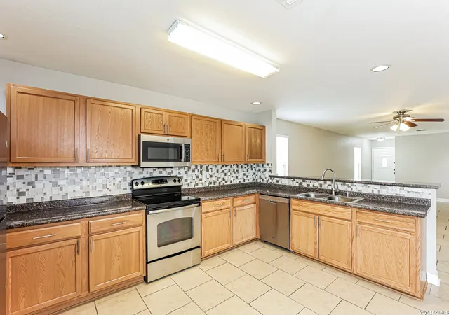 Photo 3 of Single family home for sale at 6026 Plumbago Pl, San Antonio, TX 78218 | MLS# 2014626 | Listing updated on 2026-09-16