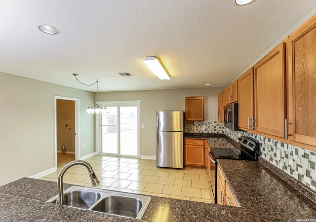 Photo 4 of Single family home for sale at 6026 Plumbago Pl, San Antonio, TX 78218 | MLS# 2014626 | Listing updated on 2026-09-16