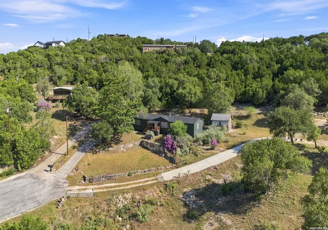 Photo 2 of Single family home for sale at 410 Duck Mountain Ln, Canyon Lake, TX 78133 | MLS# 2015183 | Listing updated on 2026-09-09