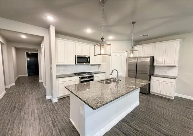 Photo 2 of Single family home for sale at 415 Northern Pike Dr, Willis, TX 77318 | MLS# 18660664 | Listing updated on 2026-09-04