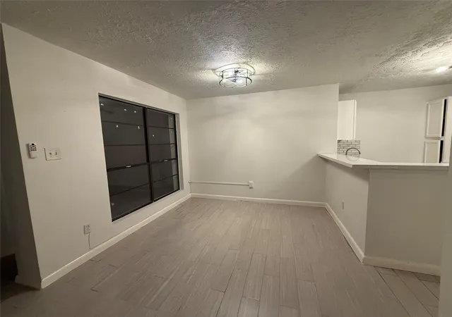 Photo 3 of Townhouse for sale at 8553 Wilcrest Dr, Houston, TX 77099 | MLS# 42467892 | Listing updated on 2026-09-19