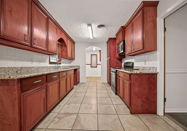 Single family home for sale at 6027 De Moss Dr, Houston, TX 77081 | MLS# 83165507