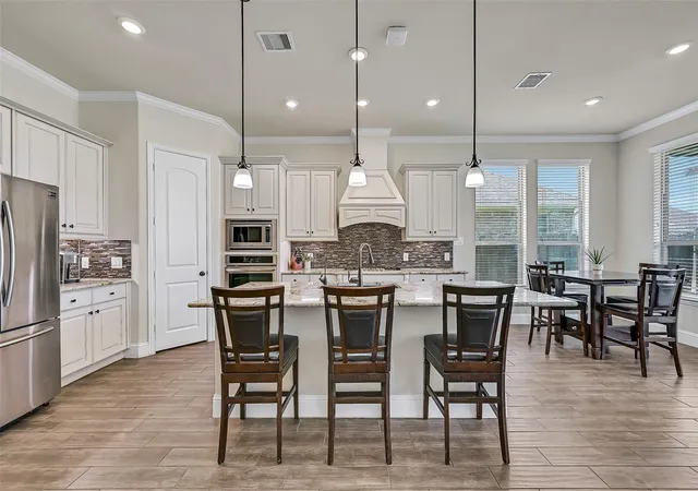 Photo 3 of Single family home for sale at 1645 Longwood Glen Ln, Friendswood, TX 77546 | MLS# 12786316 | Listing updated on 2026-10-09