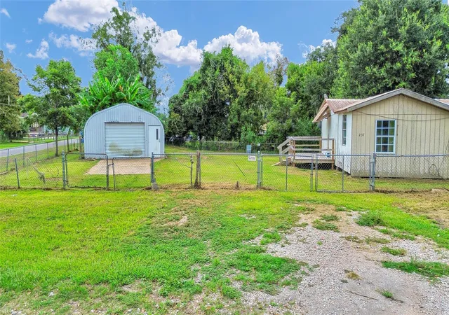 Photo 3 of Single family home for sale at 237 N Austin Dr, Angleton, TX 77515 | MLS# 12352915 | Listing updated on 2026-09-12
