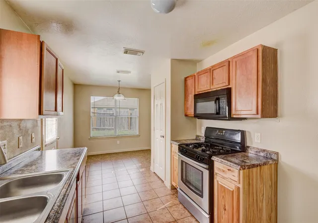 Photo 3 of Single family home for sale at 21807 Yucca Tip Ln, Houston, TX 77073 | MLS# 57967407 | Listing updated on 2026-09-11