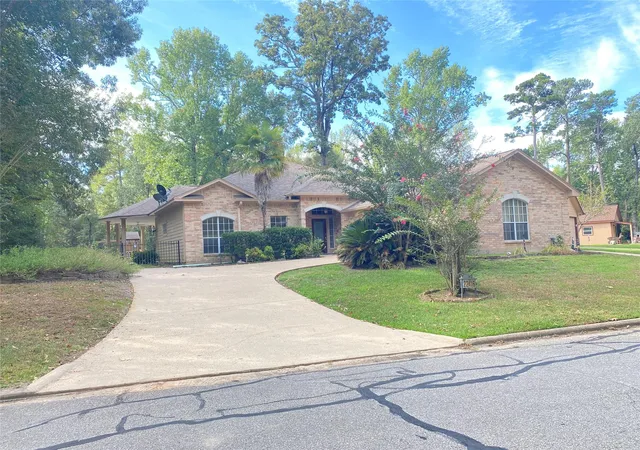 Photo 1 of Single family home for sale at 22416 Pebble Beach Way, Huntsville, TX 77320 | MLS# 784450 | Listing updated on 2026-09-15