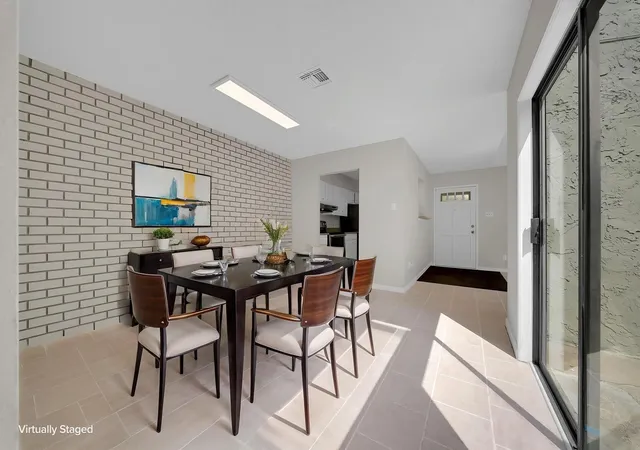 Photo 2 of Townhouse for sale at 2415 Briarwest Blvd, Houston, TX 77077 | MLS# 68621358 | Listing updated on 2026-09-19