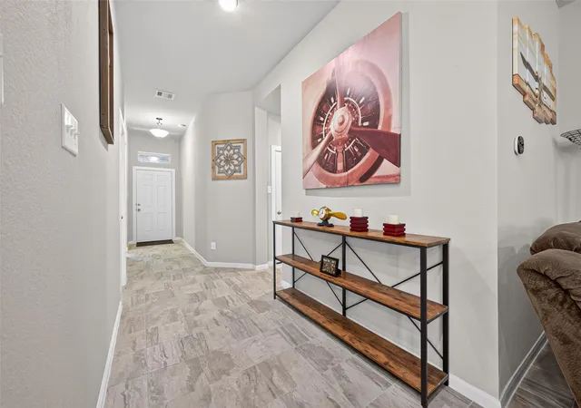 Photo 3 of Single family home for sale at 135 Winged Elm Ct, Willis, TX 77318 | MLS# 79183538 | Listing updated on 2026-09-11