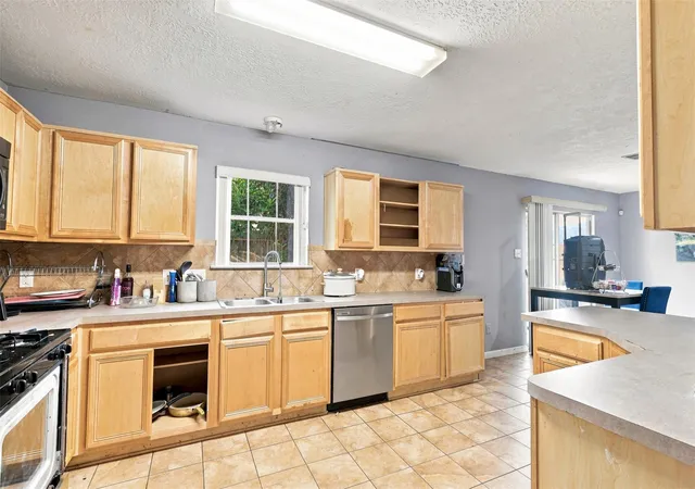 Photo 4 of Single family home for sale at 2906 Latch Ln, Houston, TX 77038 | MLS# 7421825 | Listing updated on 2026-09-12