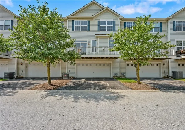 Photo 2 of Townhouse for sale at 1005 Alberta Rd, Elgin, IL 60124 | MLS# 12745668 | Listing updated on 2026-09-07