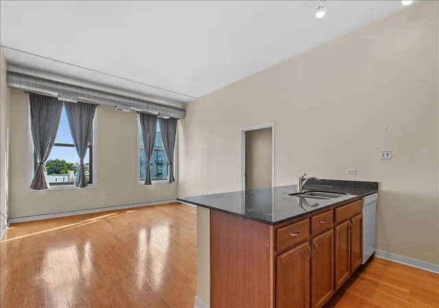 Photo 3 of Condo for sale at 4015 N Milwaukee Ave #416, Chicago, IL 60641 | MLS# 12747689 | Listing updated on 2026-09-08