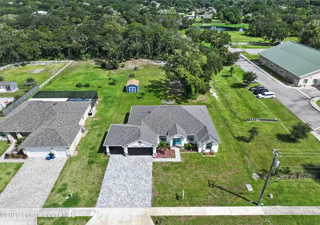 Photo 3 of Single family home for sale at 1845 Market Cir Ne, Palm Bay, FL 32905 | MLS# 1076119 | Listing updated on 2026-09-14