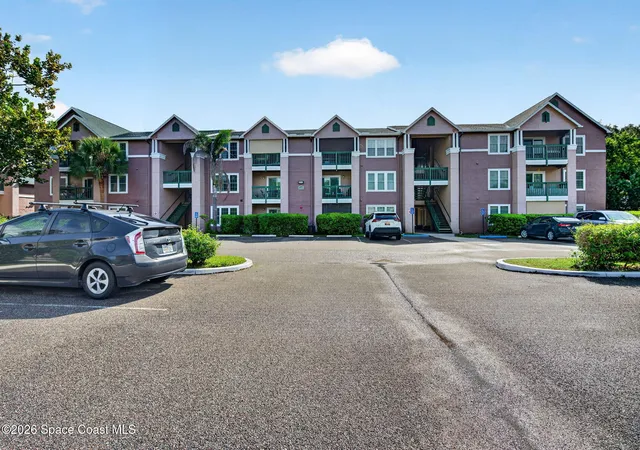 Listing Photo 1 - Condo for sale in building located at 7667 N Wickham Rd, Melbourne, FL 32940 - Unit #1118
