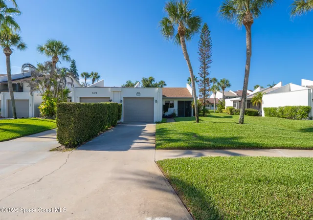 Photo 1 of Townhouse for sale at 411 Hawthorne Ct, Indian Harbour Beach, FL 32937 | MLS# 1085166 | Listing updated on 2026-09-16