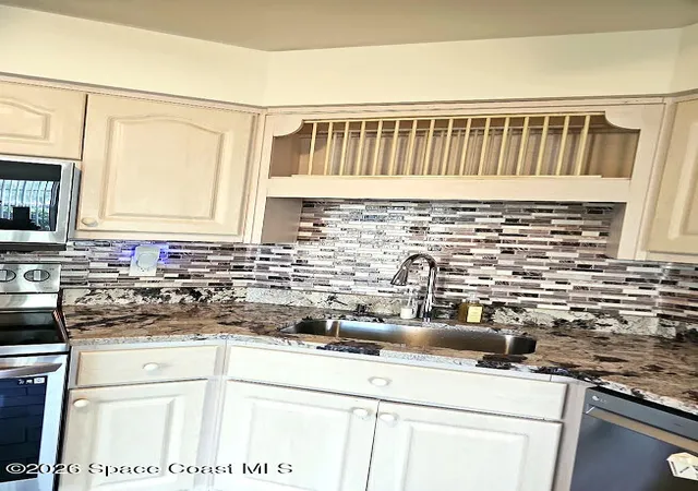 Photo 3 of Condo for sale at 4880 Lake Waterford Way W #3-220, Melbourne, FL 32901 | MLS# 1085195 | Listing updated on 2026-10-24