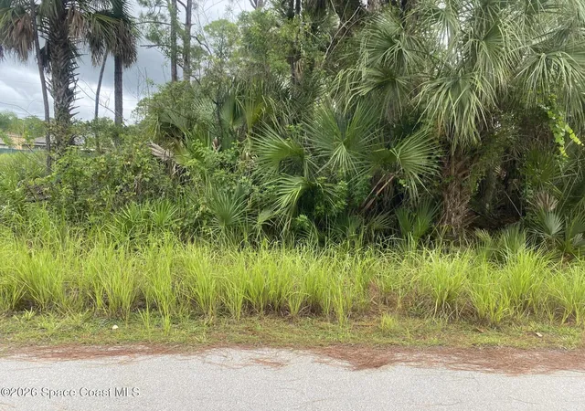 Photo 1 of Land for sale at 427 Sw Garnet St, Palm Bay, FL 32908 | MLS# 1086414 | Listing updated on 2026-09-09