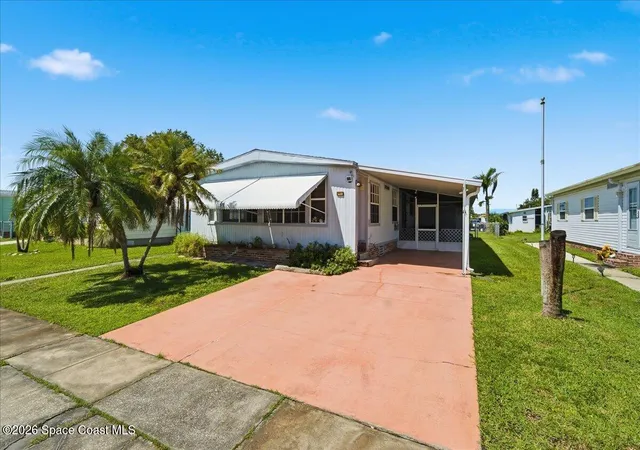 Manufactured home for sale at 1818 Coco Plum St NE, Palm Bay, FL 32905 | MLS# 1086524