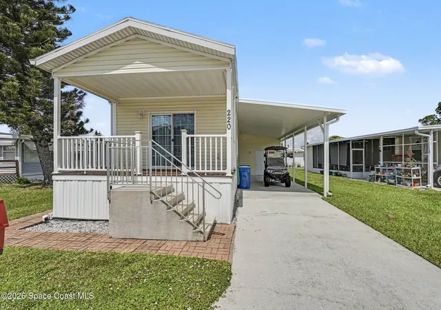 Photo 1 of Manufactured home for sale at 220 Blossom Ln Ne, Palm Bay, FL 32907 | MLS# 1086450 | Listing updated on 2026-09-11
