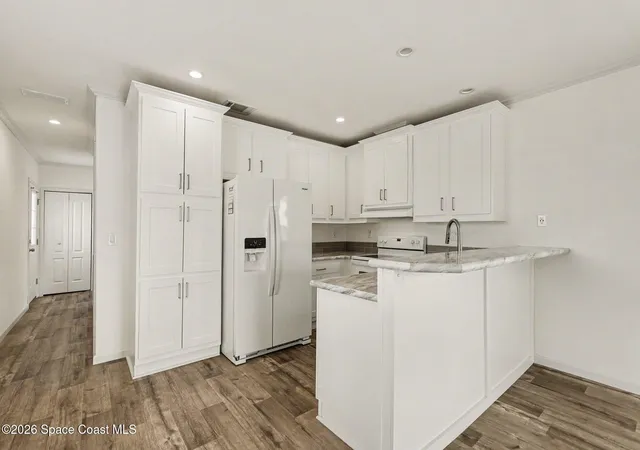 Photo 2 of Manufactured home for sale at 220 Blossom Ln Ne, Palm Bay, FL 32907 | MLS# 1086450 | Listing updated on 2026-09-11