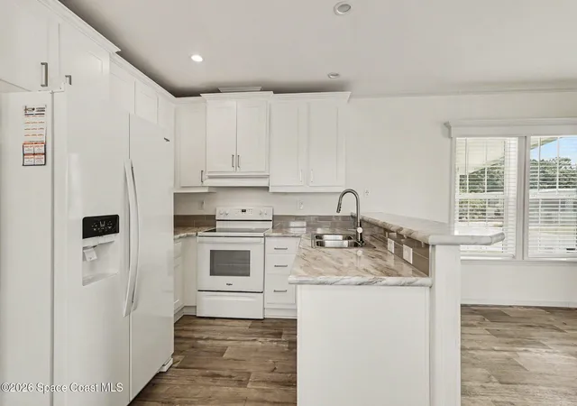 Photo 3 of Manufactured home for sale at 220 Blossom Ln NE, Palm Bay, FL 32907 | MLS# 1086450 | Listing updated on 2026-09-11