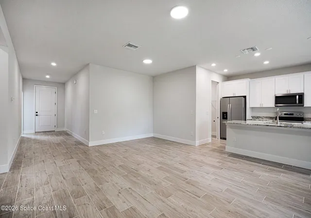Photo 3 of Single family home for sale at 879 Wisham St SW, Palm Bay, FL 32908 | MLS# 1086510 | Listing updated on 2026-09-02