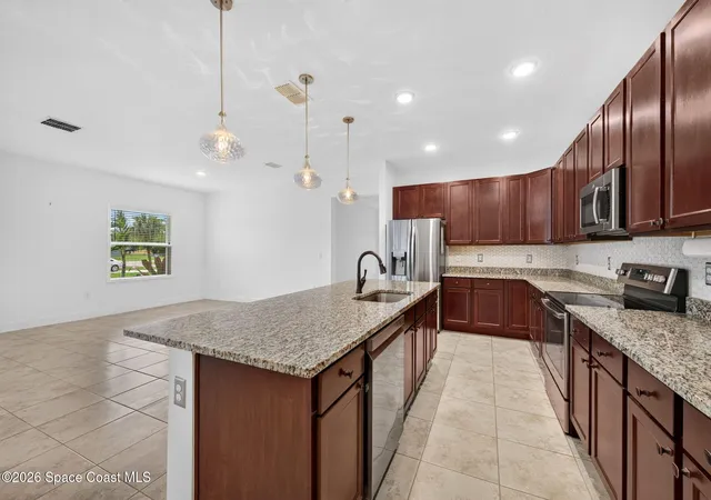Photo 2 of Single family home for sale at 2407 Fallon Blvd Ne, Palm Bay, FL 32907 | MLS# 1086574 | Listing updated on 2026-09-17
