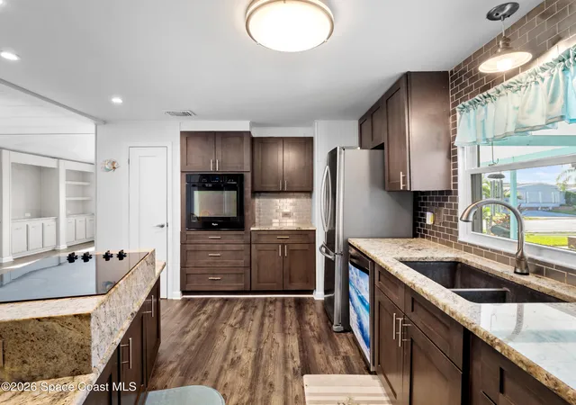 Photo 3 of Manufactured home for sale at 1972 Coco Plum St NE, Palm Bay, FL 32905 | MLS# 1086624 | Listing updated on 2026-09-17