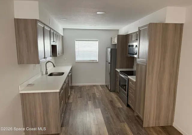 Listing Photo 5 - Condo for sale in building located at 126 Preston Ln, Melbourne, FL 32935 - Unit #126